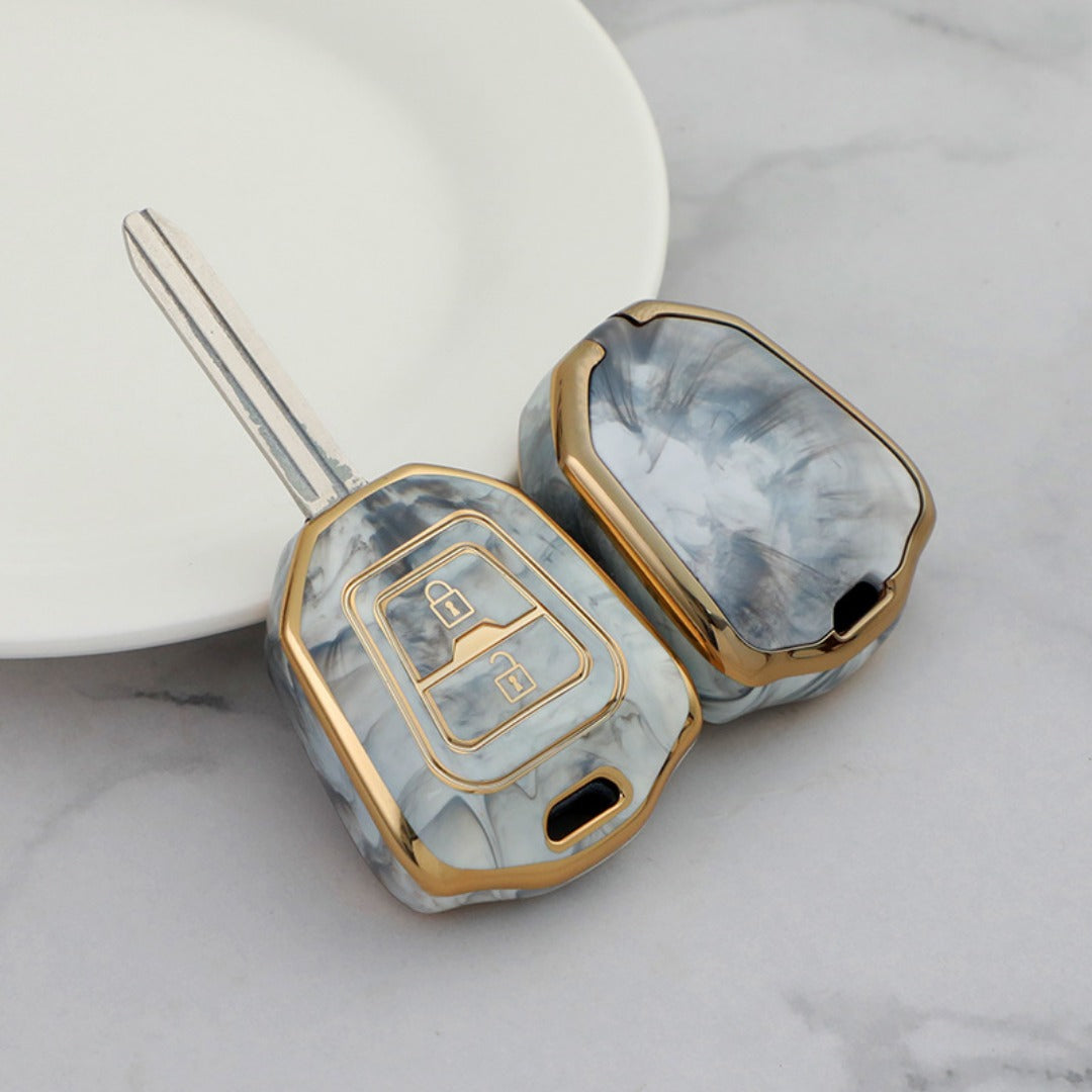Isuzu Autoschlüsseletui, goldfarben mit Jade-Einlage